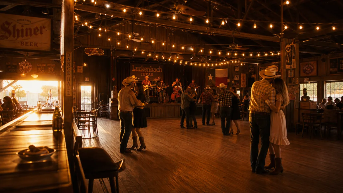 a rustic Texas dance hall interior bathed in warm golden hour light,…