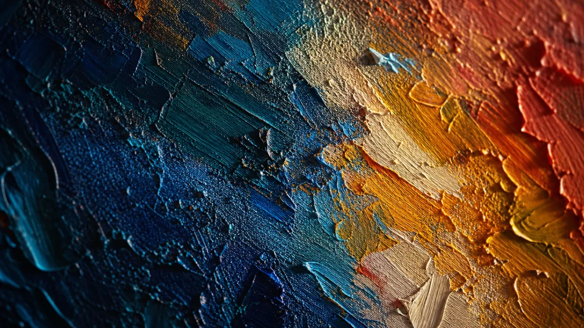 a close-up of textured paint on canvas with rich layered colors, dramatic…
